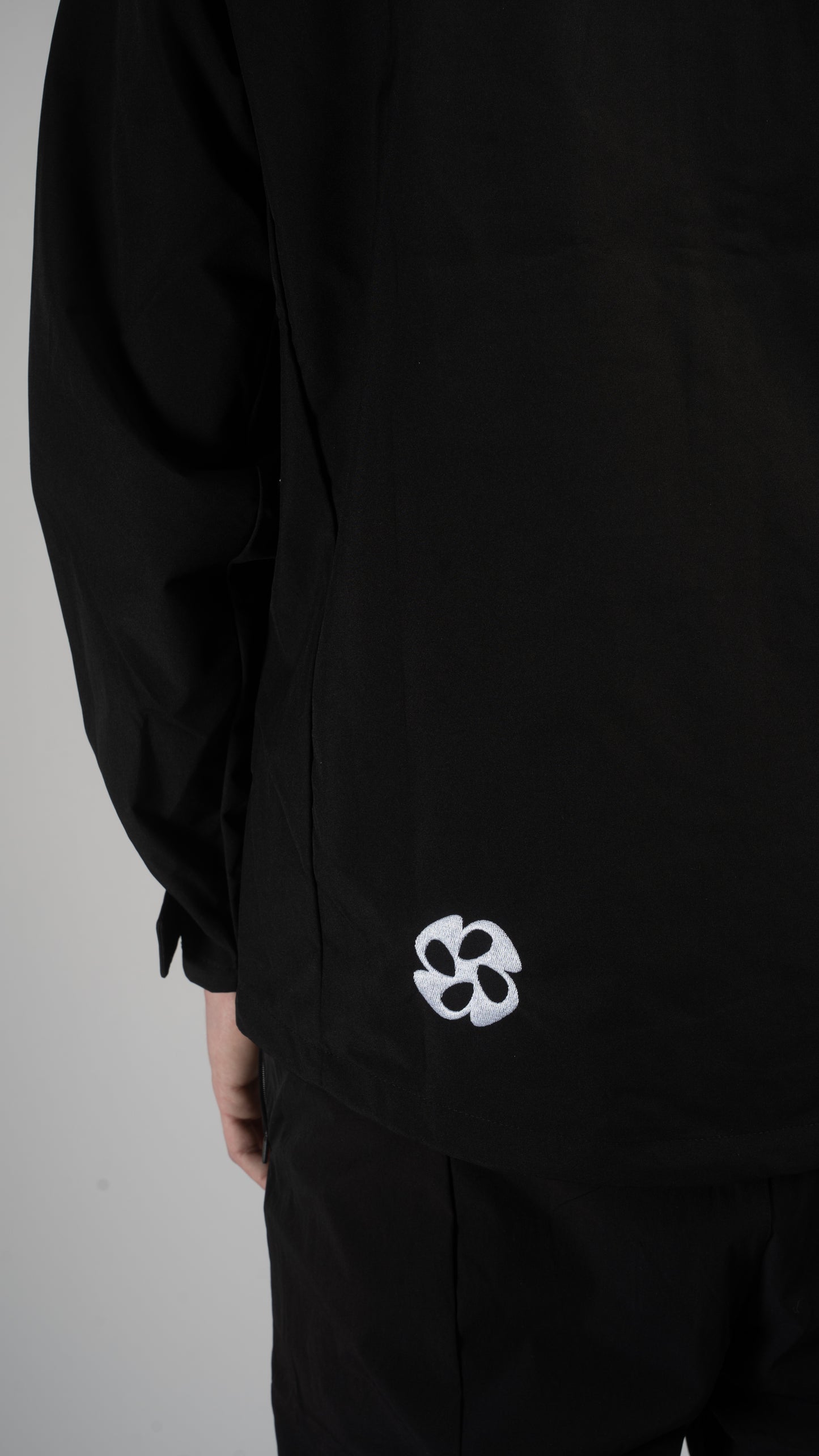 Coupe-vent Veil - Logotype